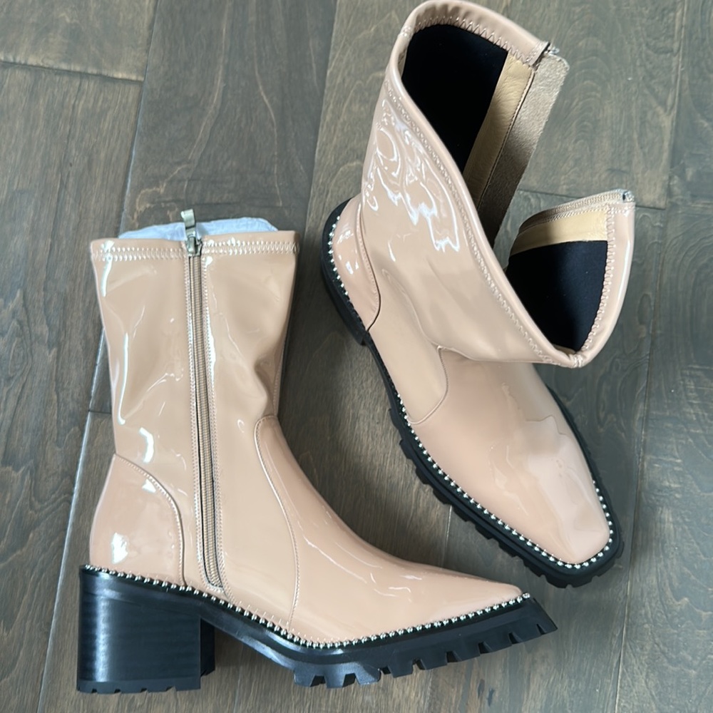 Slowline patent leather boots